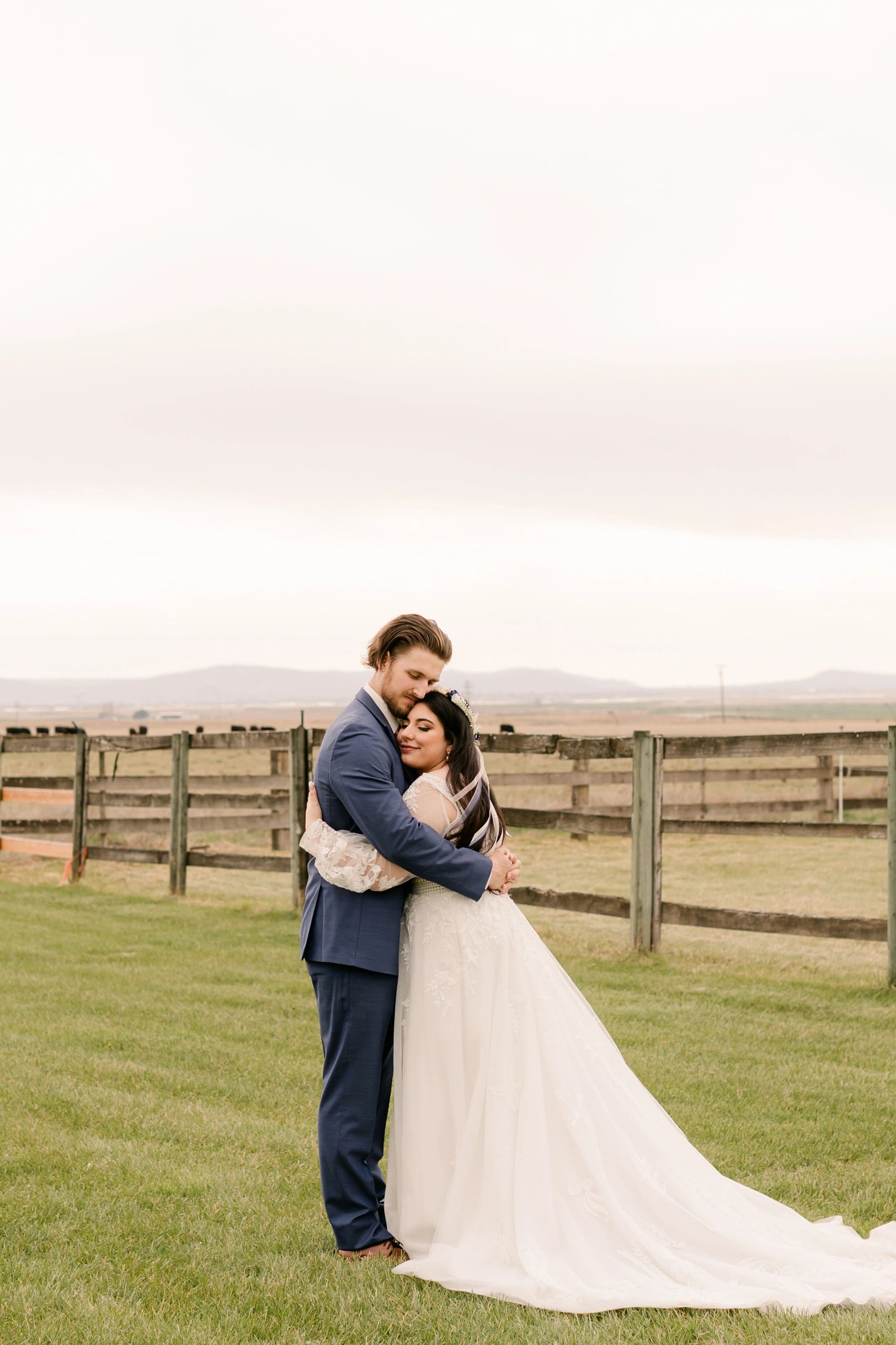 couple sharing private moment at stone ridge estates wedding venue pasco, wa Photo Credit Allison Lauryn Photography