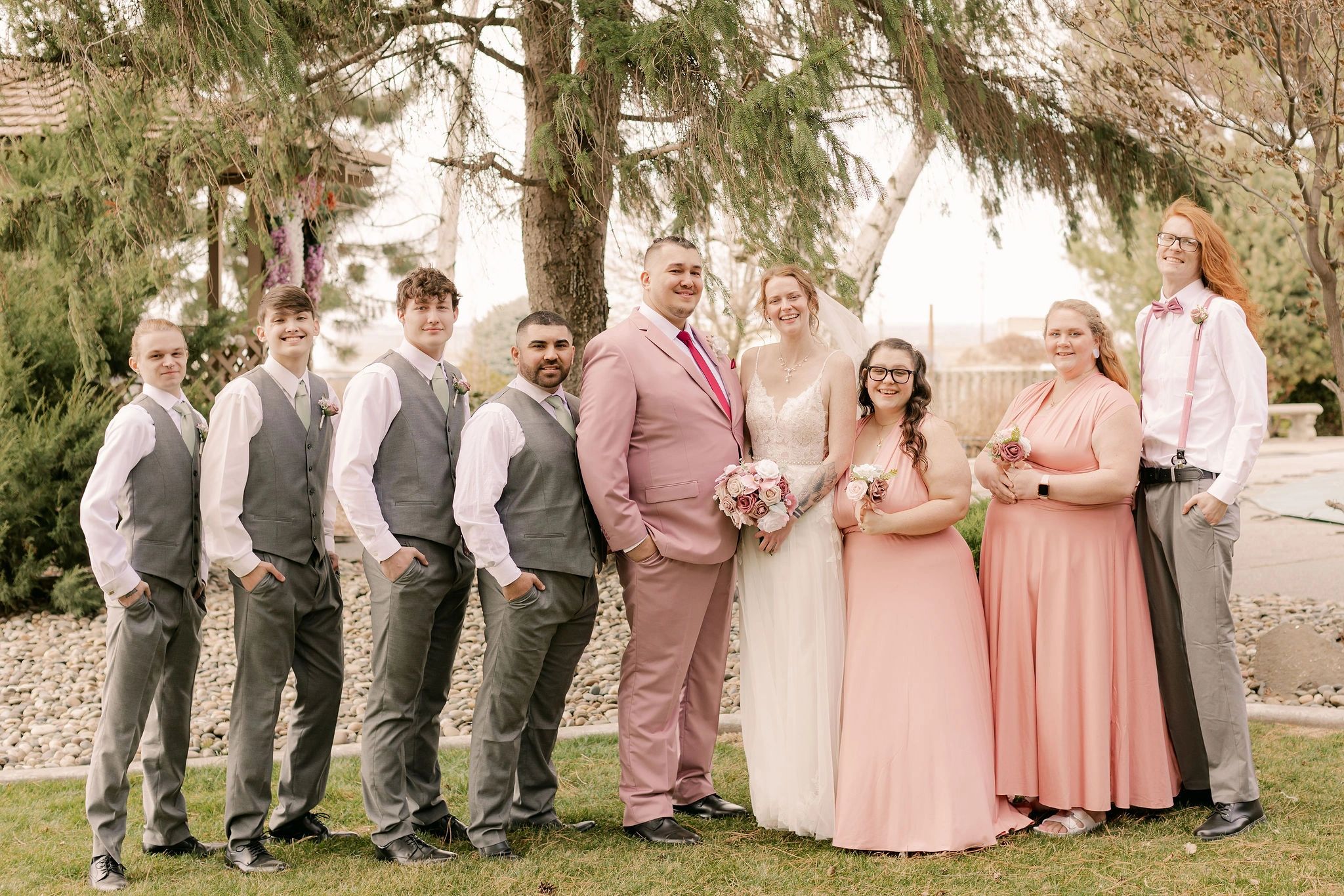 beautiful couple poses in stone ridge estates wedding venue gardens for formal wedding photos in the tri-cities, washington