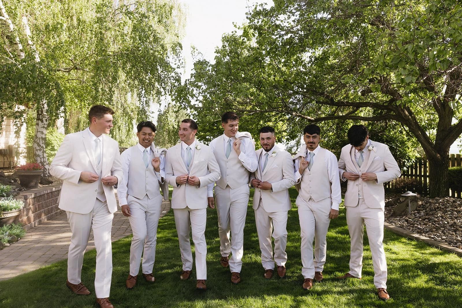 Groom at Stone Ridge Estates Wedding Venue with his Groomsmen. Wedding Venue Pasco Washington. Garden Wedding Venue. Country Wedding Venue.