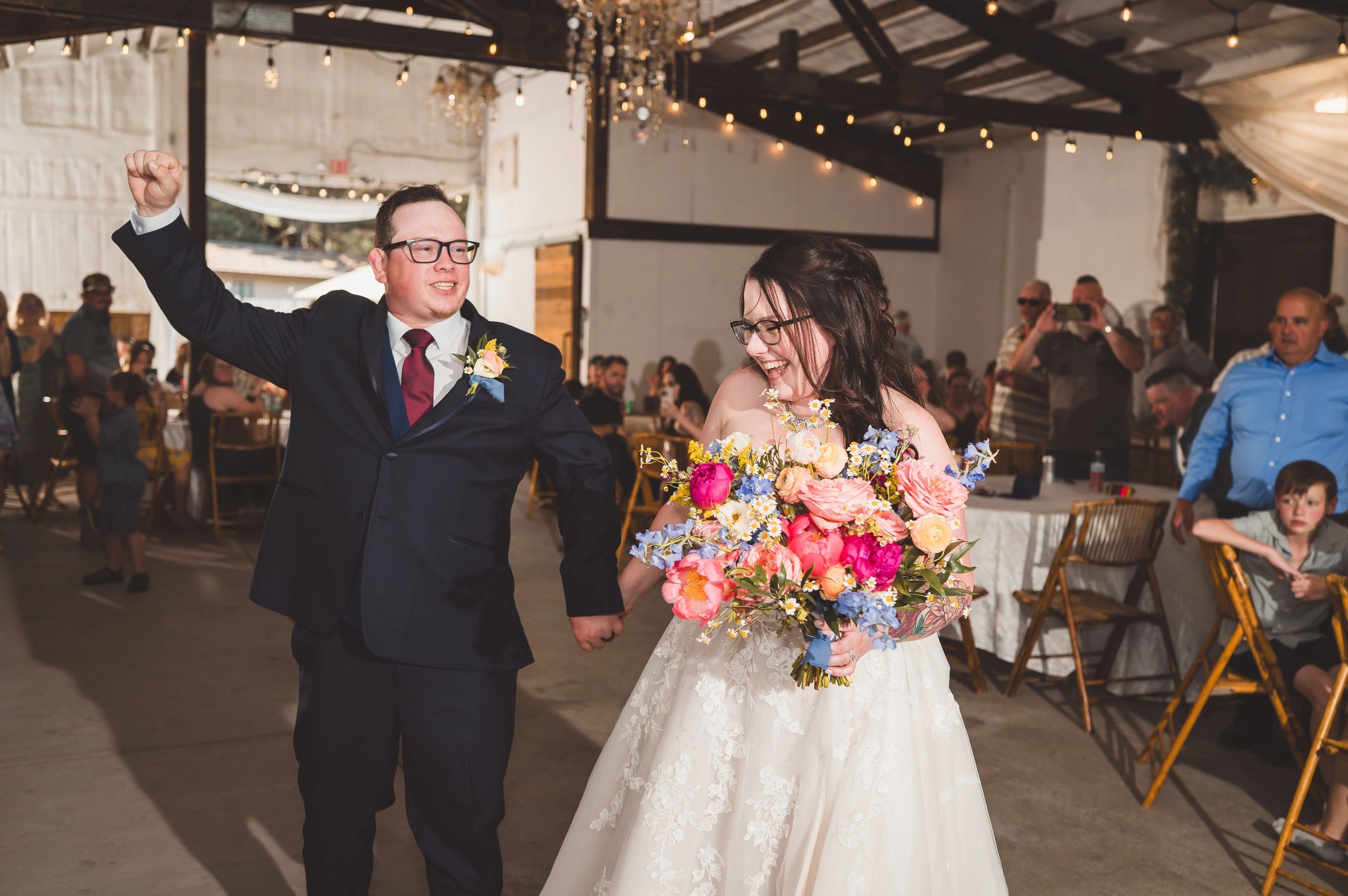 wedding couple just married at stone ridge estates wedding venue in pasco wa in the rustic country wedding venue barn