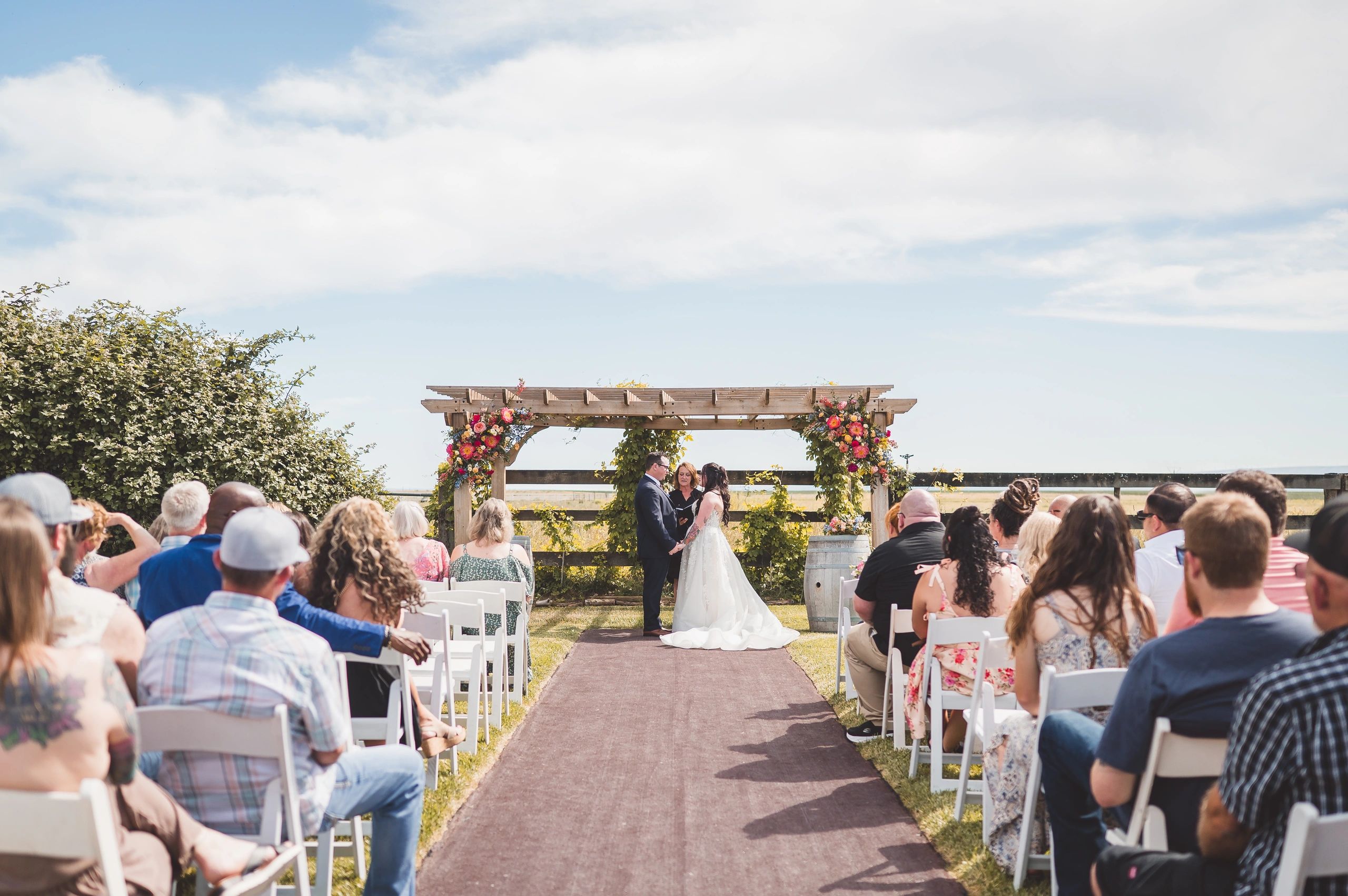 wedding couple just married at stone ridge estates wedding venue in pasco wa in the country wedding ceremony