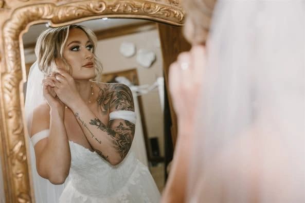 Bride getting ready in the Stone Ridge Estates bridal suite in Pasco, Washington